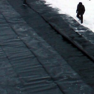 сварка рукавов мембраны шириной 5 метров укладка геомембраны строительство полигона ТБО